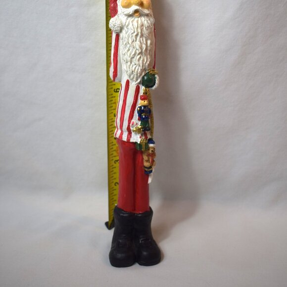 Vintage Resin Skinny Santa Claus Figure With Black Boots and Toys - Picture 10 of 11